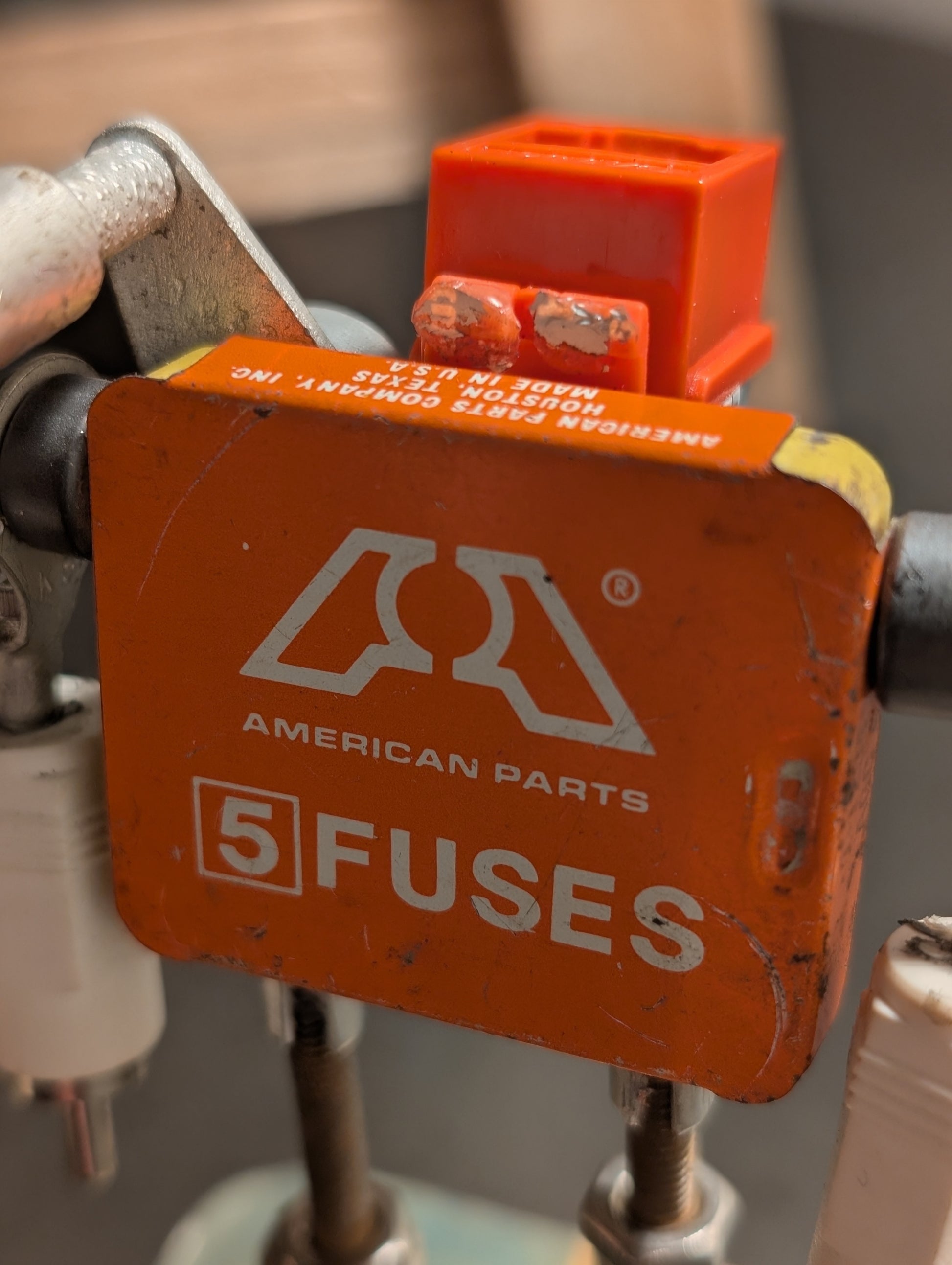 R3BOTS AF-5 American Sentinel detail: A close-up of a one-of-one upcycled industrial sculpture highlighting the authentic vintage tin art and handcrafted mechanical assembly.